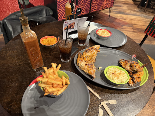 Photo of Nando's Cheltenham - Unit 2, The Brewery Quarter, St Margaret's Rd, Cheltenham GL50 4EQ